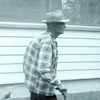 John P. Young, older, with cane